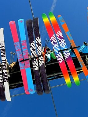 underside of fork tree skis on chairlift